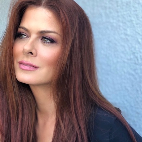 Headshot of Debra Messing